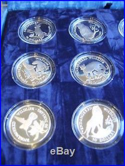 1991 Set of 12 Endangered Wildlife Silver Proof $50 coins, Cook Islands in case