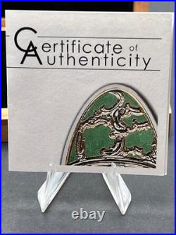 2013 Cook Islands $5 Imperial Egg in Cloisonné Easter in Olive. 999 Fine Silver